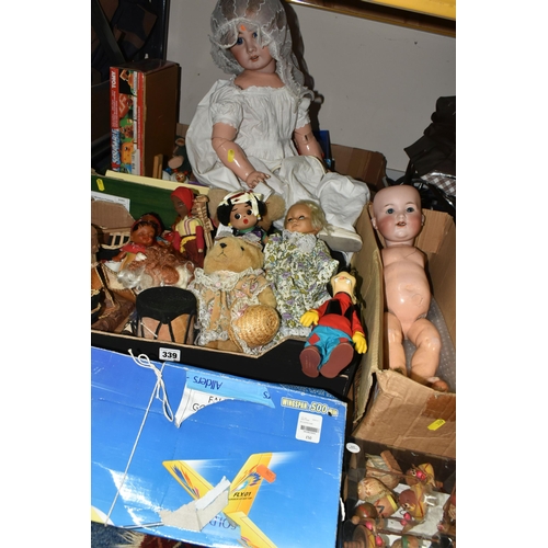 339 - THREE BOXES OF VINTAGE TOYS, DOLLS AND GAMES, to include a porcelain doll with composite body, arms ... 