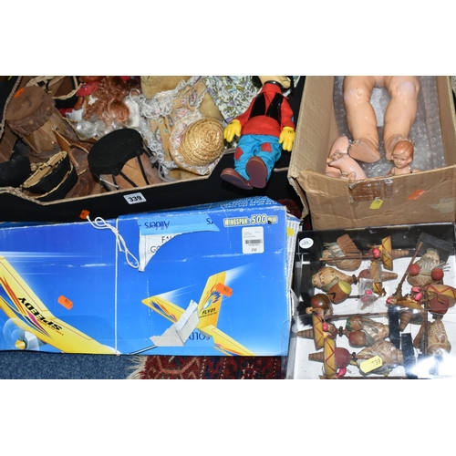 339 - THREE BOXES OF VINTAGE TOYS, DOLLS AND GAMES, to include a porcelain doll with composite body, arms ... 