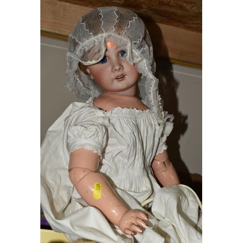 339 - THREE BOXES OF VINTAGE TOYS, DOLLS AND GAMES, to include a porcelain doll with composite body, arms ... 