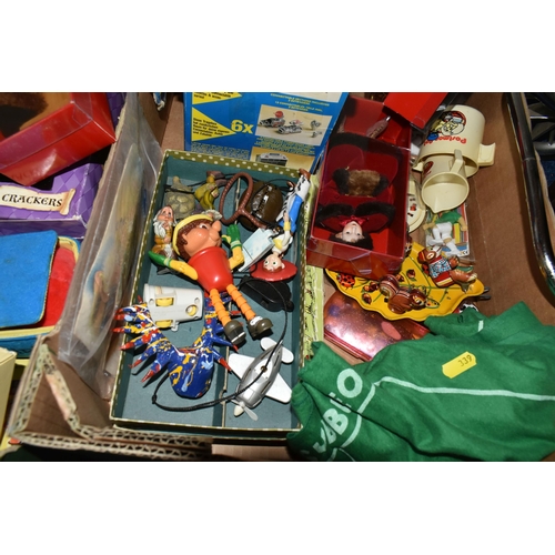 339 - THREE BOXES OF VINTAGE TOYS, DOLLS AND GAMES, to include a porcelain doll with composite body, arms ... 