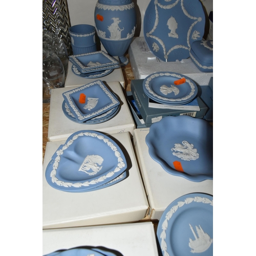 343 - A QUANTITY OF WEDGWOOD JASPERWARE, in pale blue, comprising two vases, tallest 20cm, two trinket box... 