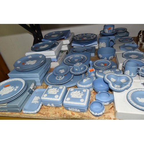 346 - A QUANTITY OF WEDGWOOD JASPERWARE, in pale blue, comprising a teacup and saucer, a Christmas 1982 ta... 