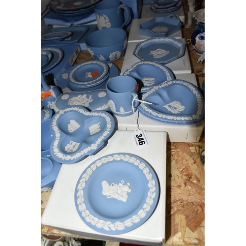 346 - A QUANTITY OF WEDGWOOD JASPERWARE, in pale blue, comprising a teacup and saucer, a Christmas 1982 ta... 