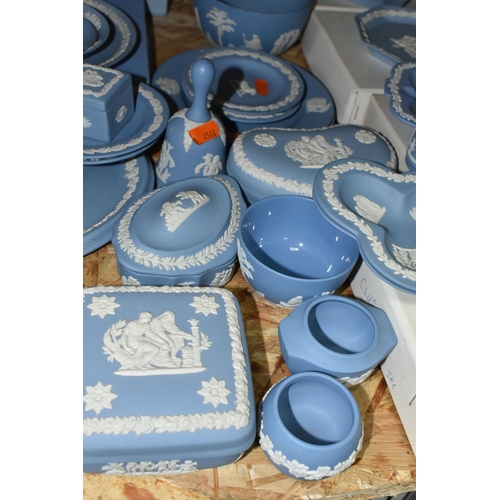 346 - A QUANTITY OF WEDGWOOD JASPERWARE, in pale blue, comprising a teacup and saucer, a Christmas 1982 ta... 