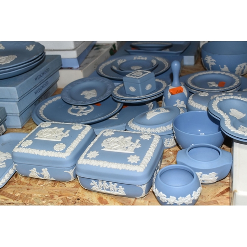 346 - A QUANTITY OF WEDGWOOD JASPERWARE, in pale blue, comprising a teacup and saucer, a Christmas 1982 ta... 