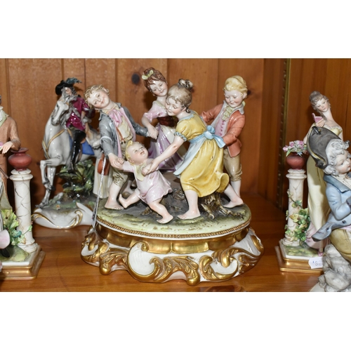 356 - SIX CAPODIMONTE PORCELAIN FIGURAL GROUPS, comprising an Italian group of children dancing around a t... 