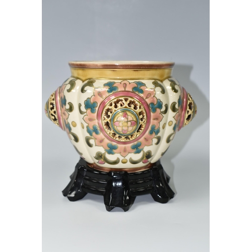 363 - AN AUSTRIAN ZSOLNAY PECS PLANTER, florally decorated  with a reticulated roundel on four sides, supp... 