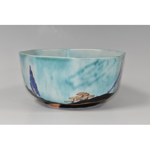 386 - A CLARICE CLIFF  INSPIRATION - CAPRICE BOWL, the octagonal bowl decorated with a stylised landscape ... 