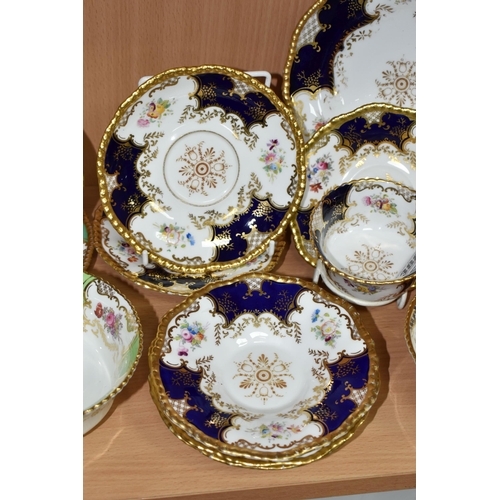 388 - A GROUP OF COALPORT 'BATWING' TEA WARE, comprising  in navy blue batwing pattern: a teacup (sounds d... 