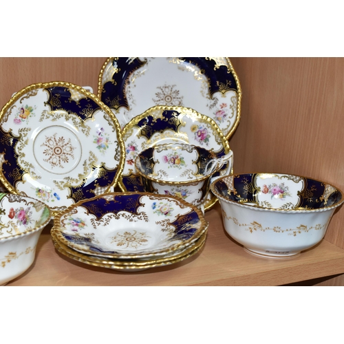 388 - A GROUP OF COALPORT 'BATWING' TEA WARE, comprising  in navy blue batwing pattern: a teacup (sounds d... 