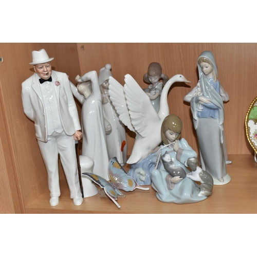 389 - SEVEN LLADRO FIGURES, A NAO DUCK AND A ROYAL DOULTON 'SIR WINSTON CHURCHILL' HN3057, A.F., the Lladr... 