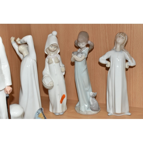 389 - SEVEN LLADRO FIGURES, A NAO DUCK AND A ROYAL DOULTON 'SIR WINSTON CHURCHILL' HN3057, A.F., the Lladr... 