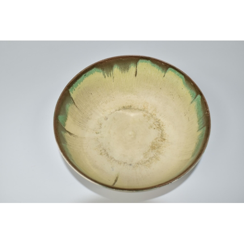 396 - A CLARICE CLIFF DELECIA CITRUS PATTERN BOWL, the worn interior with dripped bands of grey and green,... 