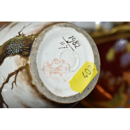 402 - A PAIR OF ROYAL BONN VASES PAINTED WITH BIRDS AND THREE ASSORTED PLATTERS, the vases with pattern no... 