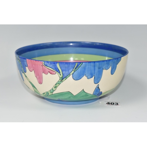 403 - A CLARICE CLIFF BIZARRE RUDYARD PATTERN BOWL, the interior with painted bands of shades of blue, gre... 