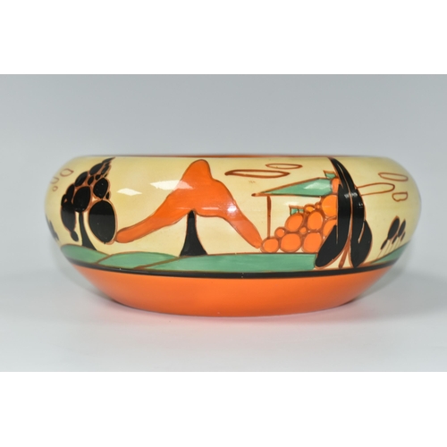 409 - A CLARICE CLIFF FANTASQUE BIZARRE TREES & HOUSE PATTERN BOWL, the interior painted with orange and b... 