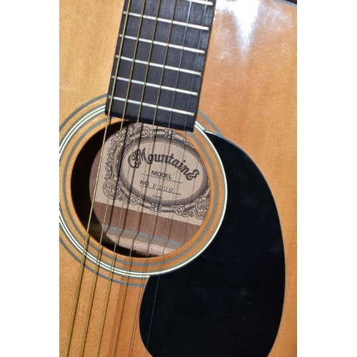 434 - A 1970s MOUNTAIN ACOUSTIC GUITAR, Model F100,  made in Japan; Back and sides: mahogany, Top: natural... 