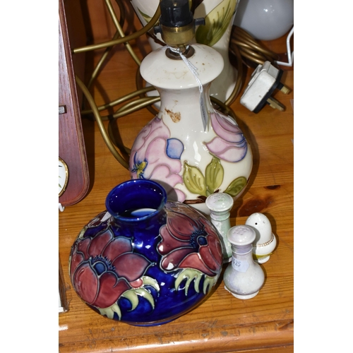 444 - A GROUP OF MOORCROFT TABLE LAMPS AND VASE, comprising a 'Magnolia' design table lamp, pale pink and ... 