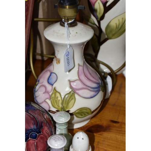 444 - A GROUP OF MOORCROFT TABLE LAMPS AND VASE, comprising a 'Magnolia' design table lamp, pale pink and ... 