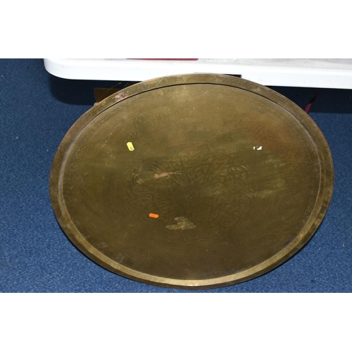 465 - TWO BOXES AND LOOSE METALWARE, to include a large circular Middle Eastern design brass serving tray/... 