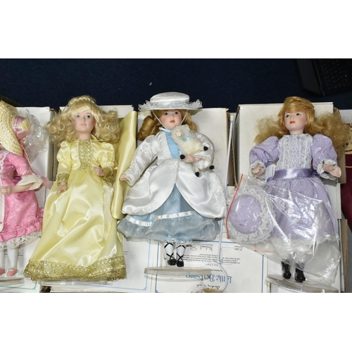 472 - TWELVE BOXED DANBURY MINT 'THE STORYBOOK DOLL COLLECTION' COLLECTORS DOLLS, all with stands and cert... 