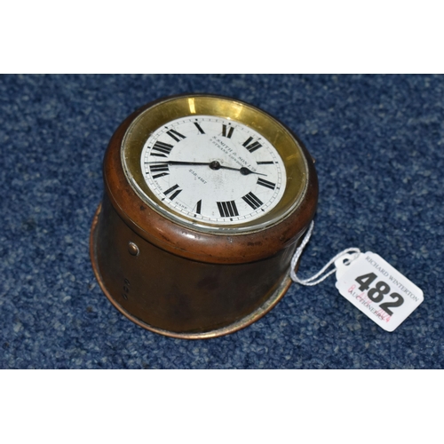 482 - A SMALL CLOCK SWISS MADE FOR S.SMITH & SON LTD. 8-day motor clock in brass case, stamped 370, with k... 