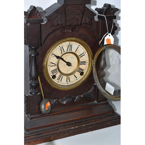 483 - A AMERICAN MANTEL CLOCK, made by The Ansonia Clock Company - New York, a stained pine, striking gong... 