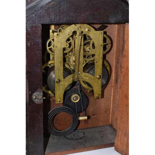 483 - A AMERICAN MANTEL CLOCK, made by The Ansonia Clock Company - New York, a stained pine, striking gong... 