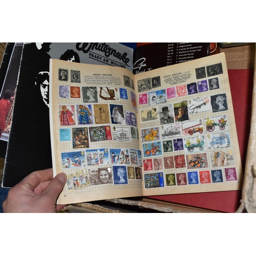 487 - A QUANTITY OF ASSORTED ANNUALS, COMICS, STAMPS AND CIGARETTE CARDS ETC., to include a quantity of 19... 