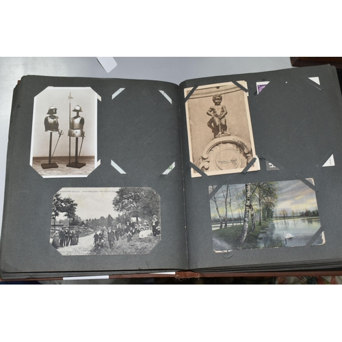 489 - TWO POSTCARD ALBUMS one album contains a miscellaneous collection of approximately 284 early-late 20... 