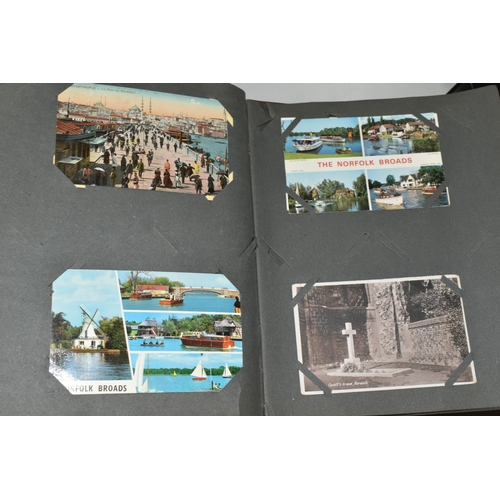 489 - TWO POSTCARD ALBUMS one album contains a miscellaneous collection of approximately 284 early-late 20... 