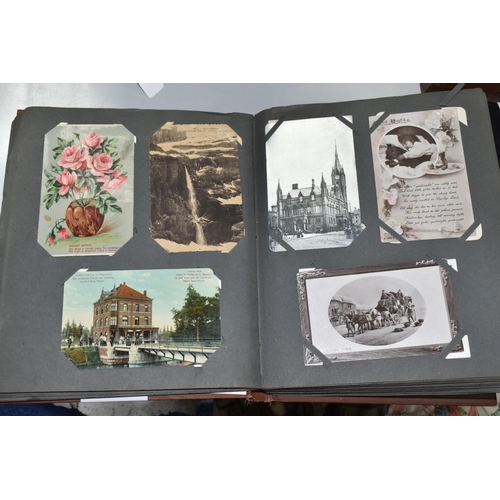 489 - TWO POSTCARD ALBUMS one album contains a miscellaneous collection of approximately 284 early-late 20... 