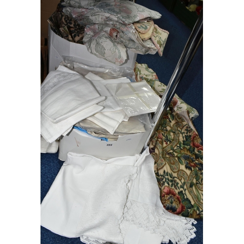 494 - TWO BOXES OF VINTAGE CURTAINS AND TABLE LINEN, to include a quantity of curtain linings, lace and cr... 