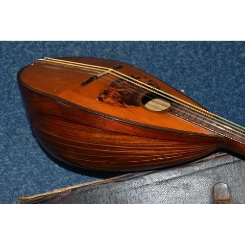 497 - A CASED EARLY 20TH CENTURY MARIO CASELLA MANDOLIN, eight strings, tortoiseshell sound hole, overall ... 