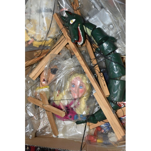 507 - A BOX CONTAINING A PELHAM PINOCCHIO PUPPET AND ELEVEN HOMEMADE PUPPETS, Pinocchio unboxed, the other... 