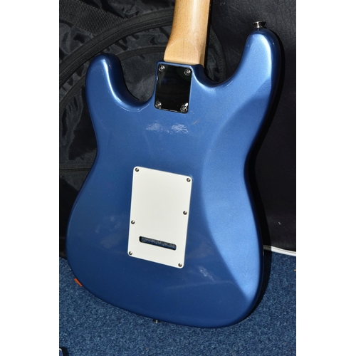 510 - AN ENCORE SIX STRING ELECTRIC GUITAR, metallic blue and white, length 100cm approx., with a Ritter s... 