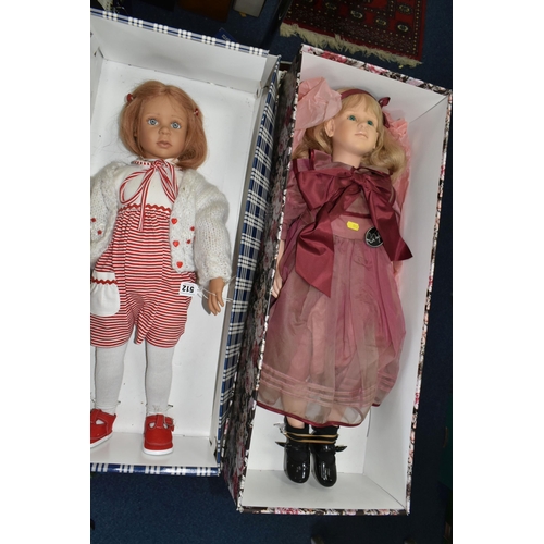 512 - A BOXED RUTH TREFFEISEN VINYL COLLECTORS DOLL, with swing tag, height approx. 75cm with a boxed Luna... 