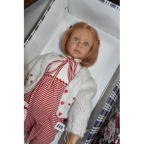 512 - A BOXED RUTH TREFFEISEN VINYL COLLECTORS DOLL, with swing tag, height approx. 75cm with a boxed Luna... 