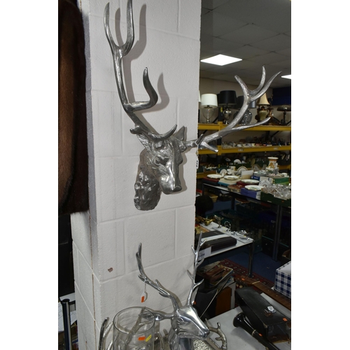 514 - FOUR PIECES OF STAG THEMED MODERN METALWARE, comprising two wall mounts, width of widest 56cm, a twi... 