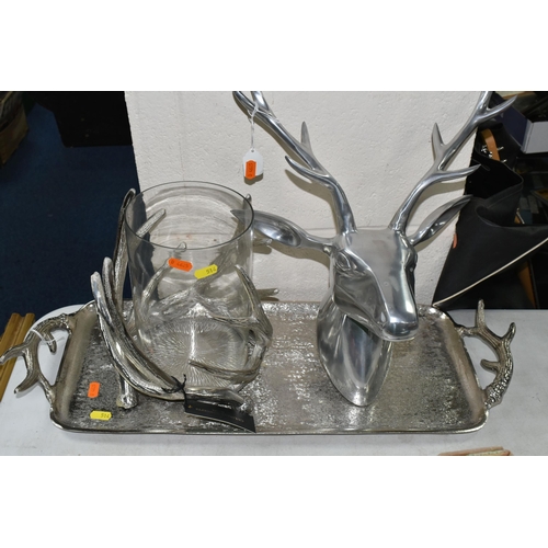 514 - FOUR PIECES OF STAG THEMED MODERN METALWARE, comprising two wall mounts, width of widest 56cm, a twi... 