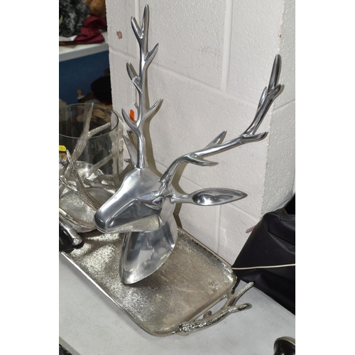 514 - FOUR PIECES OF STAG THEMED MODERN METALWARE, comprising two wall mounts, width of widest 56cm, a twi... 