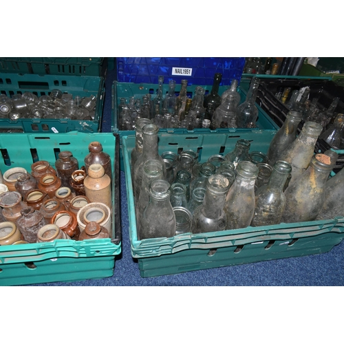 525 - FIVE CRATES OF VINTAGE GLASS BOTTLES AND STONEWARE, to include a collection of over one hundred bott... 