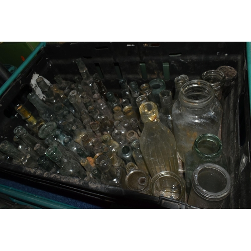 525 - FIVE CRATES OF VINTAGE GLASS BOTTLES AND STONEWARE, to include a collection of over one hundred bott... 