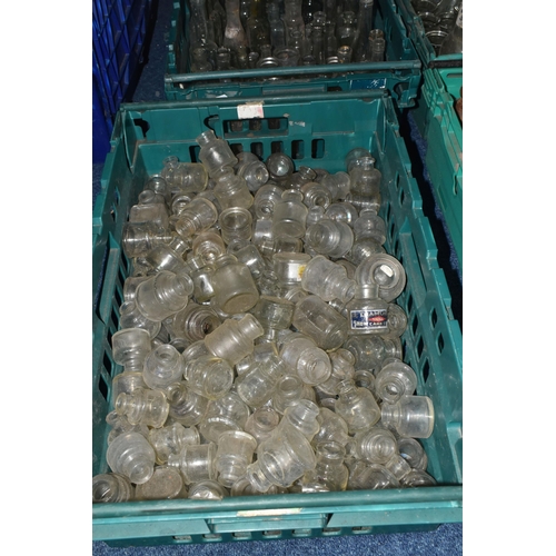 525 - FIVE CRATES OF VINTAGE GLASS BOTTLES AND STONEWARE, to include a collection of over one hundred bott... 