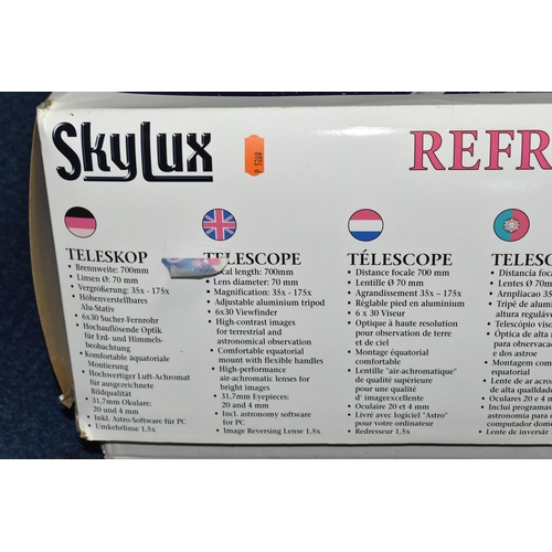 538 - A BOXED SKYLUX 70/700 TELESCOPE, appears to be in used condition, majority of components appear to b... 