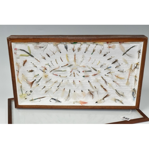 549 - A DISPLAY BOX OF VINTAGE SALMON AND TROUT FLIES, a quantity of flies are mounted into a glass topped... 