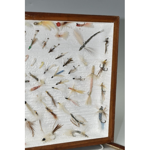 549 - A DISPLAY BOX OF VINTAGE SALMON AND TROUT FLIES, a quantity of flies are mounted into a glass topped... 