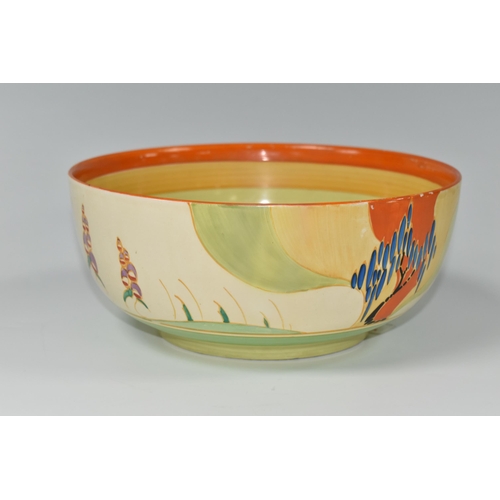 551 - A CLARICE CLIFF 'WINDBELLS' DESIGN BOWL, with a vibrant orange, yellow, green and cream banding on t... 