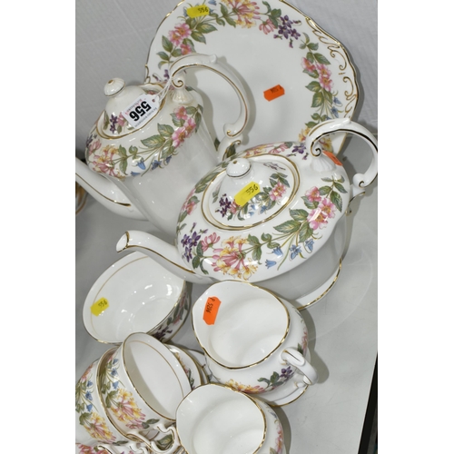 556 - A GROUP OF PARAGON 'COUNTRY LANE' PATTERN COFFEE AND TEAWARE, comprising  a cake plate, coffee pot, ... 