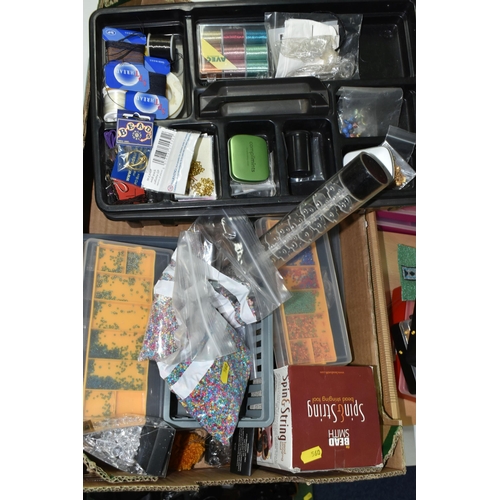 560 - TWO BOXES AND LOOSE GLASS AND PLASTIC BEADS AND BEADING LOOM, to include twelve plastic storage cont... 